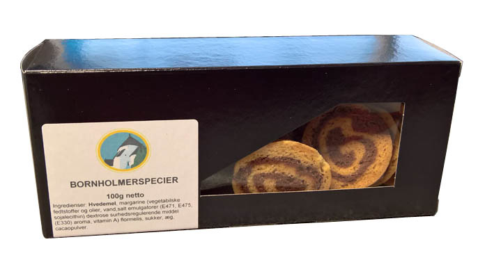 Sort æske m. hvid label. Indholdet ligner tynde kanelsnegle.